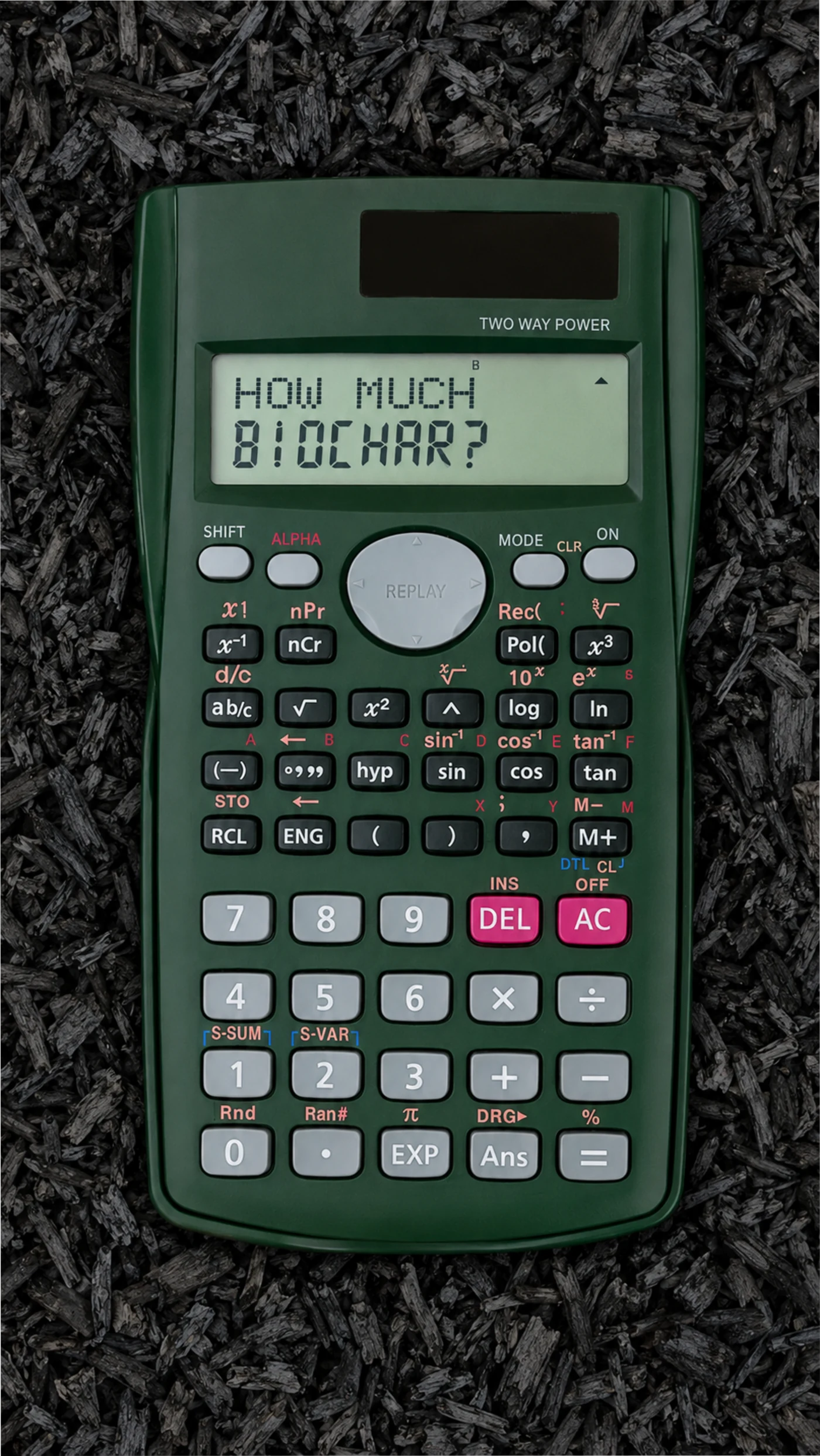 Biochar calculator resting on Biochar particles